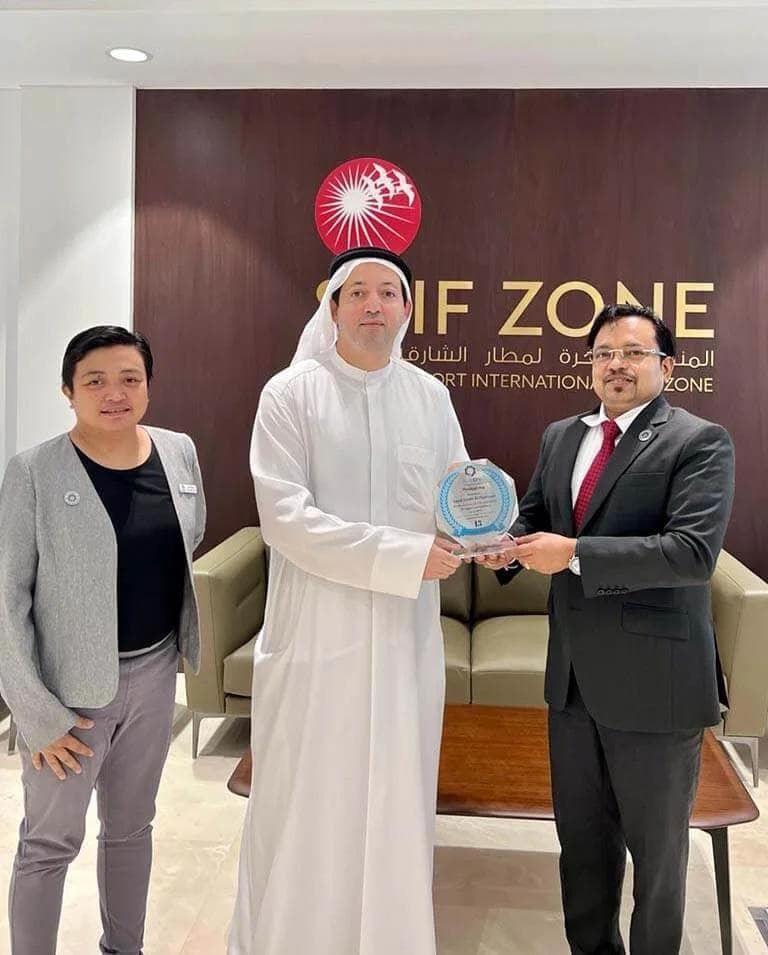 SAIF Zone's Director General presenting a Thanksgiving memento to AURION's Managing Director, Mr. Syam P. Prabhu