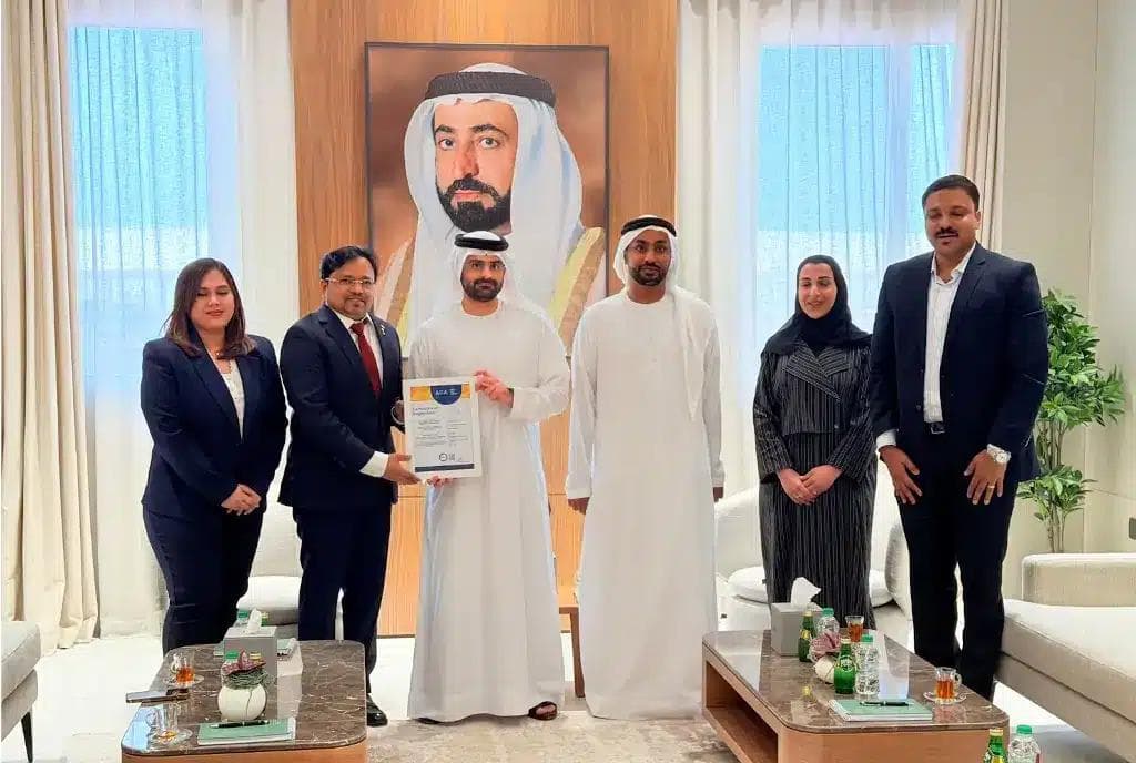 AURION's Founder and Managing Director, Mr. Syam P. Prabhu, handing over seven ISO certifications to H.E. Sheikh Sultan Bin Abdullah Al Qasimi, Director, Sharjah Department of Statistics and Community Development